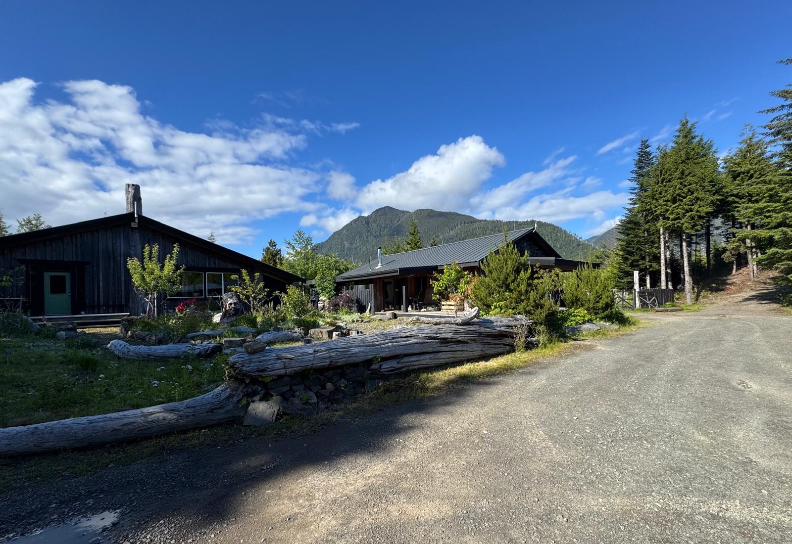 The Longhouse and Lofthouse at Rugged Point below Remarkable Cone